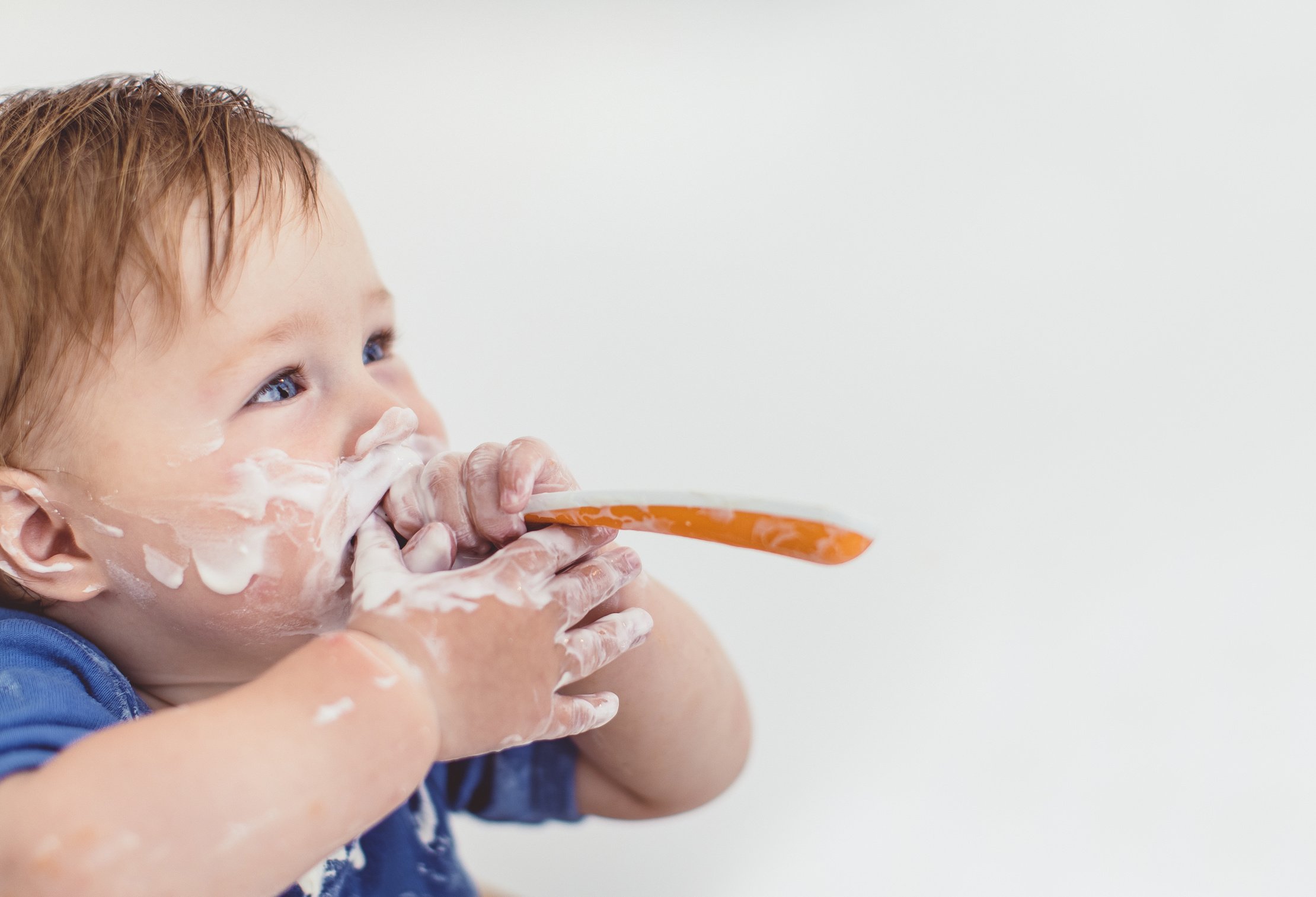 Baby Boy Eating Yoghurt With Spoon, Baby Led Weaning